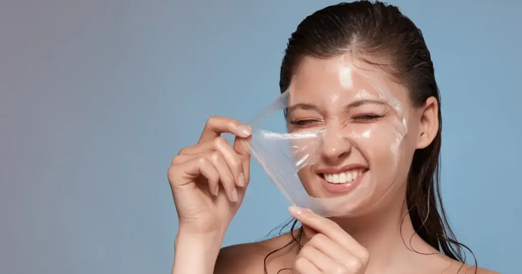 Woman peeling off VI Peel mask for glowing skin in Corpus Christi, TX spa